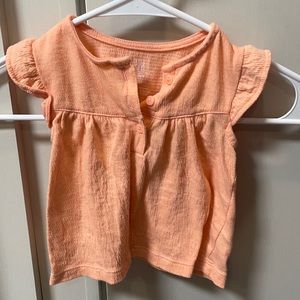 Pink Carter’s shirt